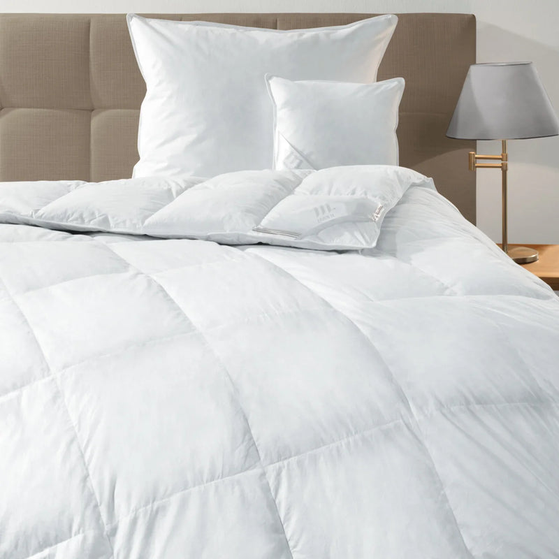 Kolekcja kołder i poduszek Perfekta